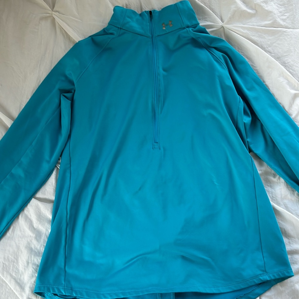 Blue under armor half zip jacket. Size Small